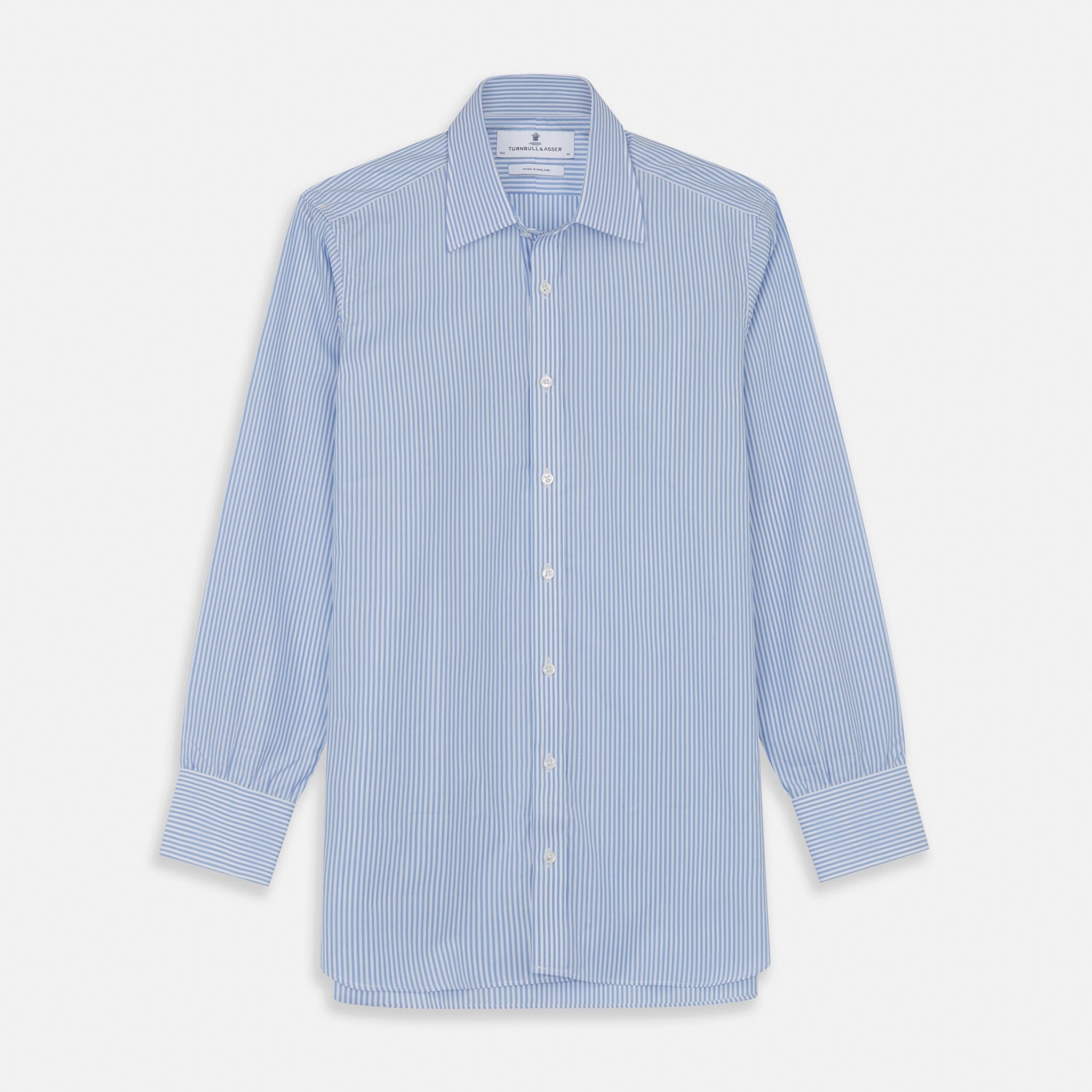 View 1 of product The Turnbull & Asser Light Blue Bengal Stripe Shirt features white vertical stripes, a classic T&A collar, and 3-button cuffs. Buttoned down the front, it’s laid flat on a white background for a timeless British look.