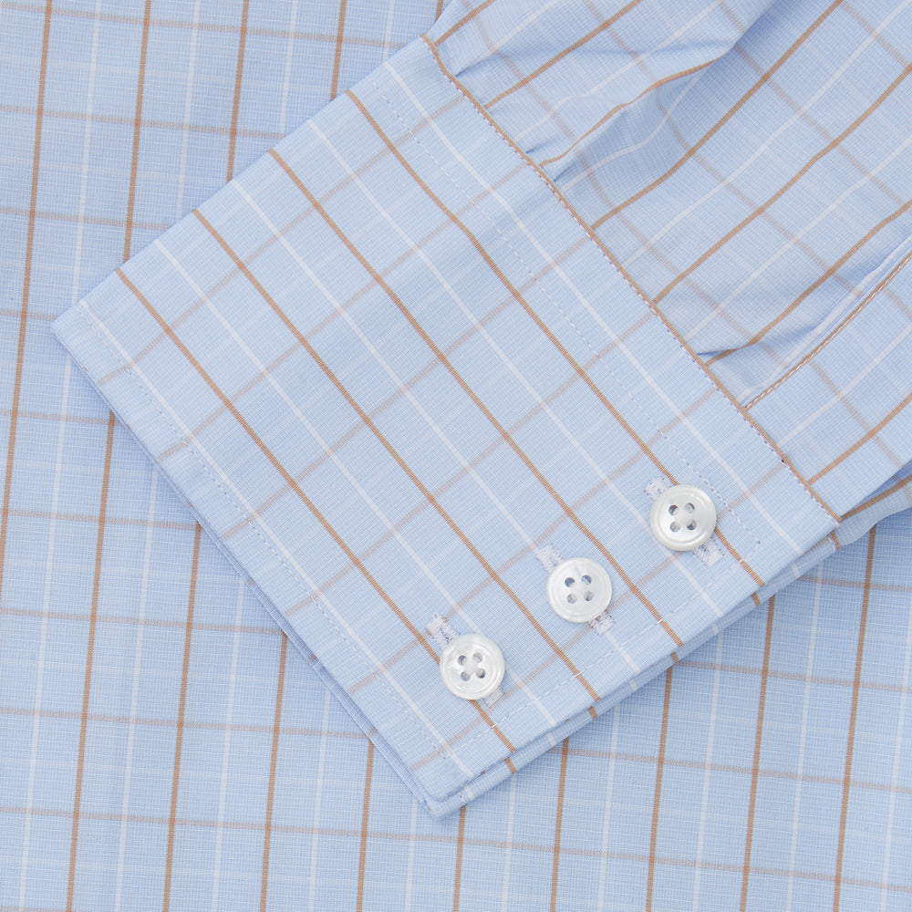A beige graph check regular fit shirt by Turnbull & Asser, featuring a T&A collar and 3-button cuffs, is neatly laid flat on a white background.