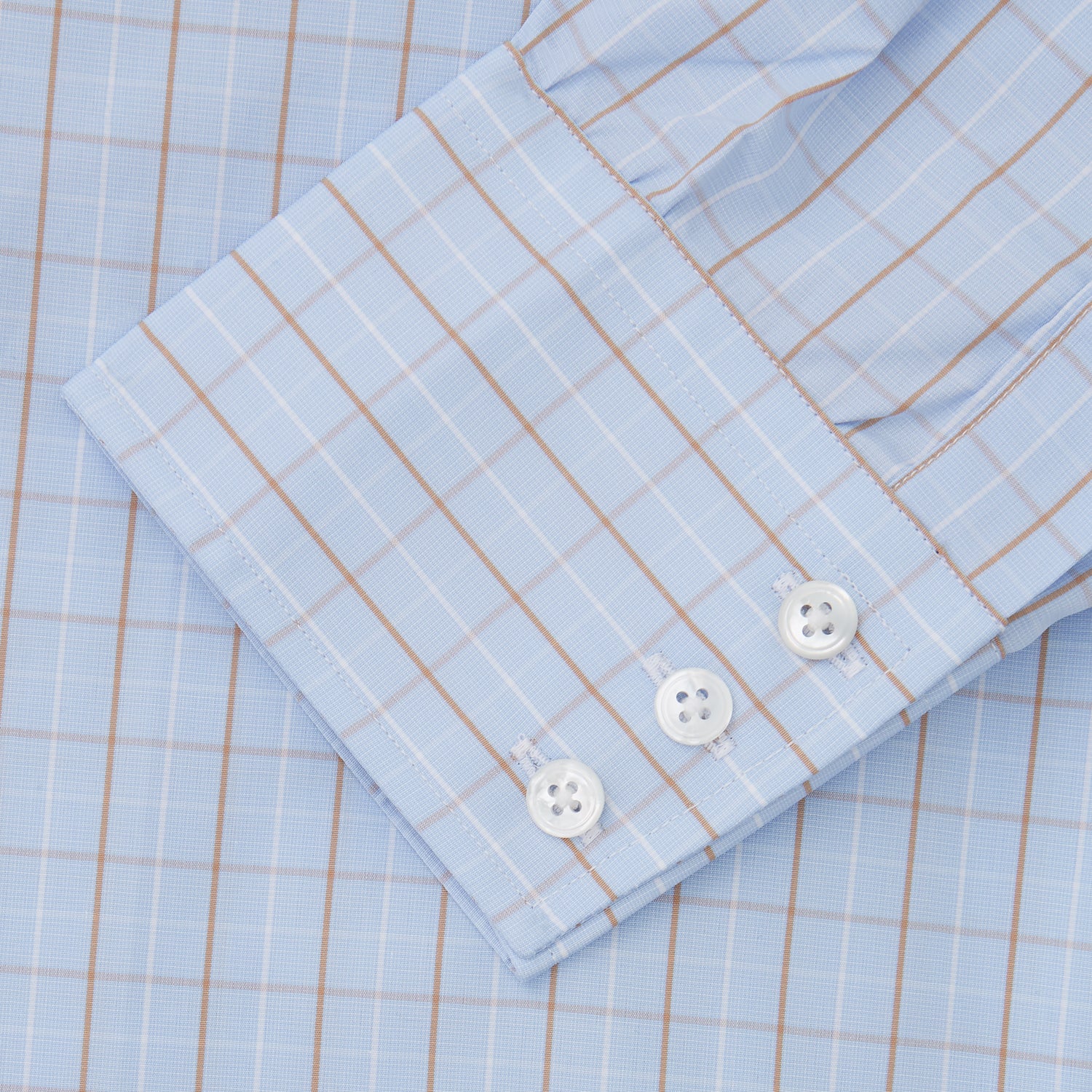 View 3 of product A beige graph check regular fit shirt by Turnbull & Asser, featuring a T&A collar and 3-button cuffs, is neatly laid flat on a white background.