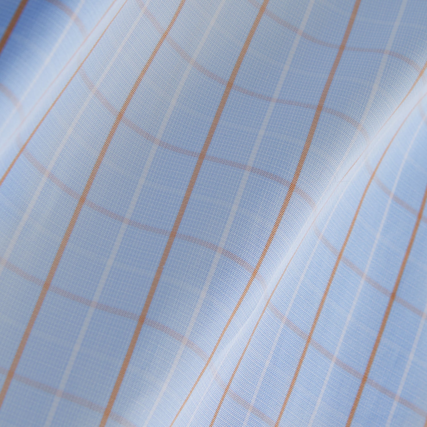 View 4 of product A beige graph check regular fit shirt by Turnbull & Asser, featuring a T&A collar and 3-button cuffs, is neatly laid flat on a white background.