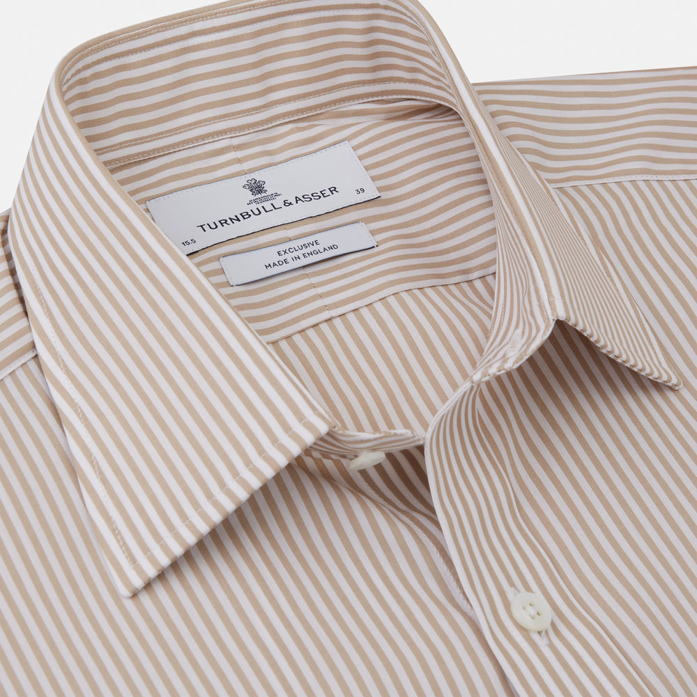 The Turnbull & Asser Sand Bengal Stripe Regular Fit Shirt features thin sand stripes, a T&A collar, and 3-button cuffs. Shown laid flat on a white background.
