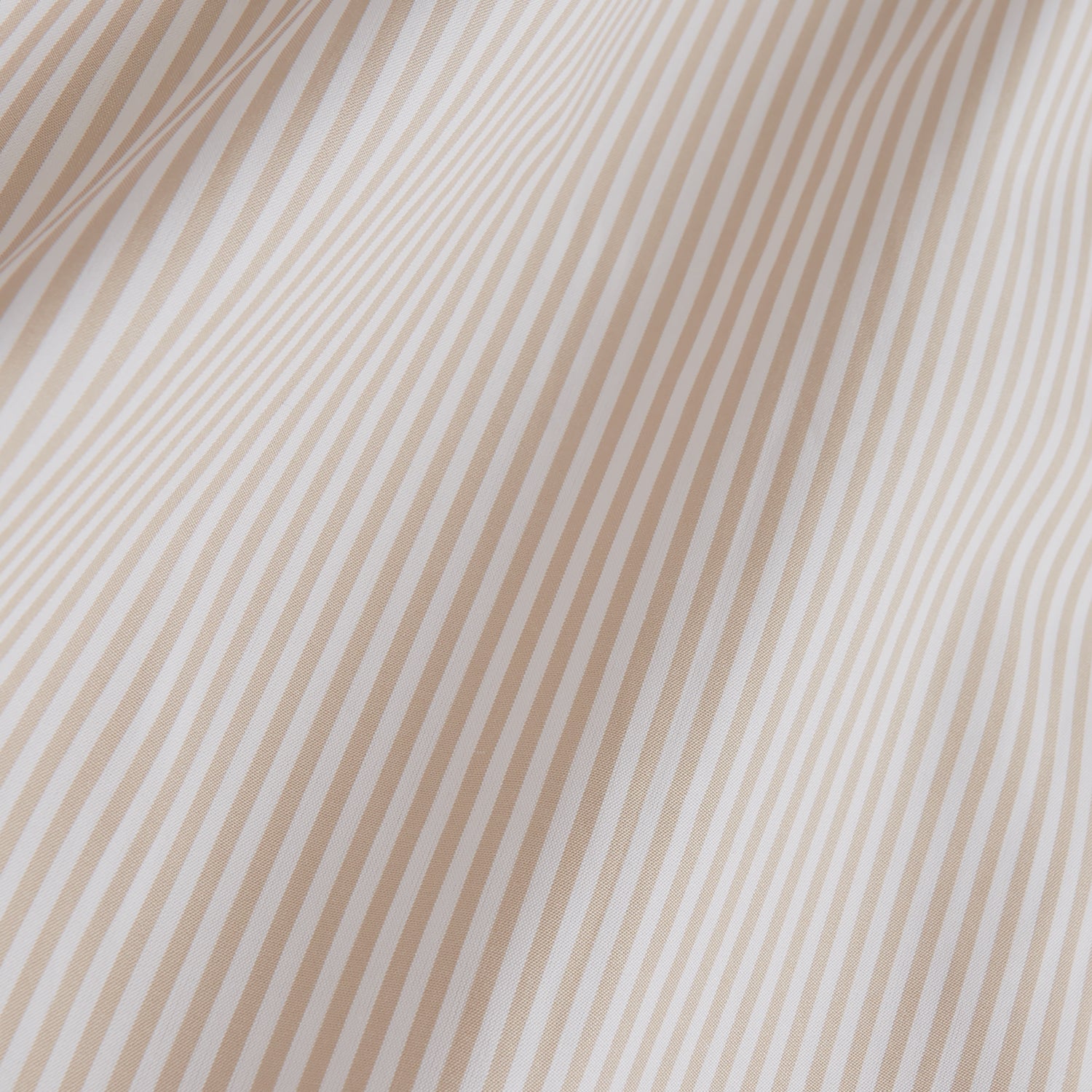 View 4 of product The Turnbull & Asser Sand Bengal Stripe Regular Fit Shirt features thin sand stripes, a T&A collar, and 3-button cuffs. Shown laid flat on a white background.
