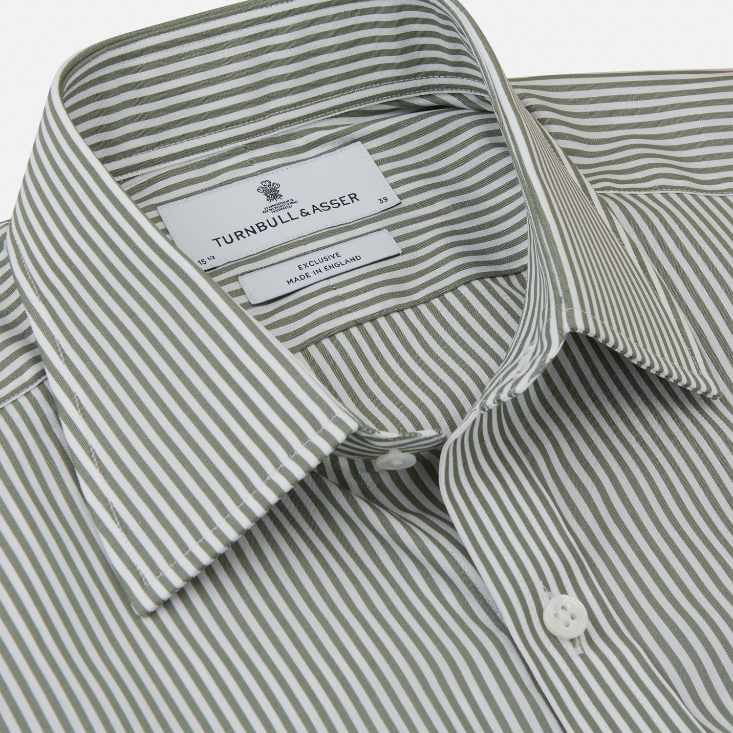 View 2 of product The Turnbull & Asser Green Bengal Stripe Regular Fit Shirt features thin green stripes, a T&A collar, and 3-button cuffs, shown on a plain white background.