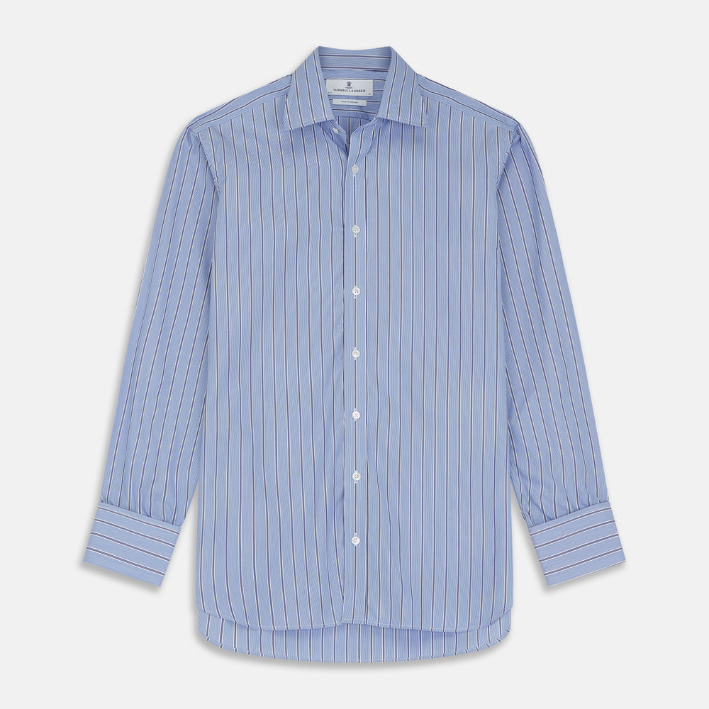 A neatly folded Turnbull & Asser Blue Stripe Regular Fit Shirt with T&A collar and square double cuffs, featuring long sleeves and thin white stripes on a light blue base, displayed on a plain white background.