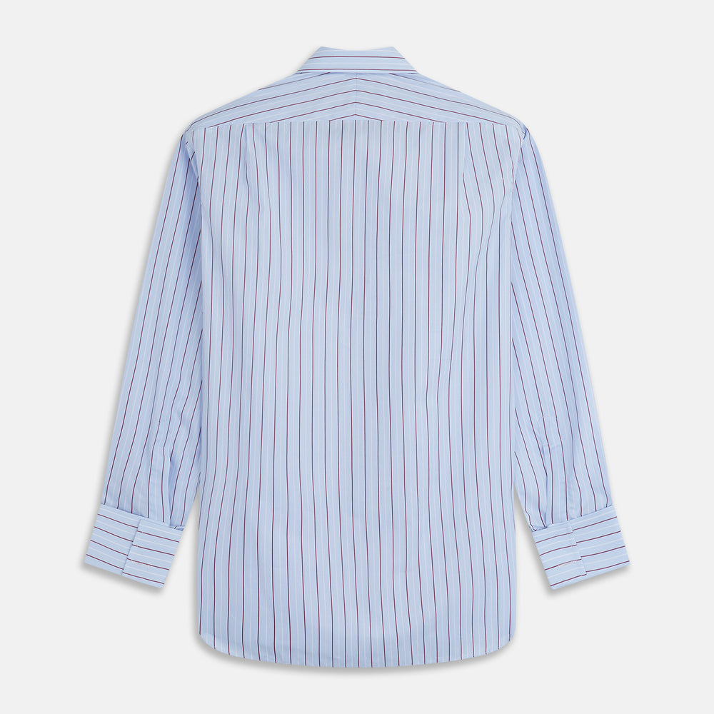 The Turnbull & Asser Burgundy Stripe Regular Fit Shirt features a T&A collar, double cuffs, and white buttons. Made from light blue Italian cotton poplin with vertical burgundy and white pinstripes. Laid flat on a white background.