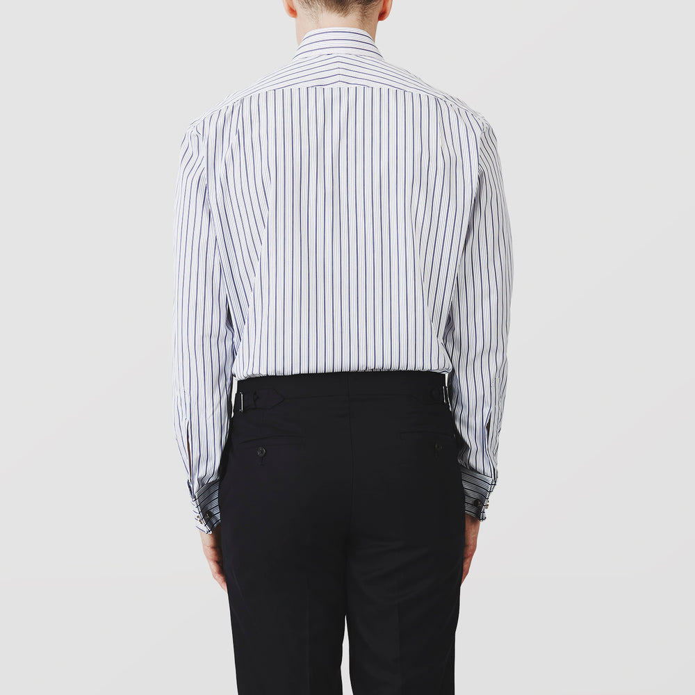 The Turnbull & Asser Navy Stripe Regular Fit Shirt features a T&A collar, square double cuffs, and thin vertical navy stripes on white.