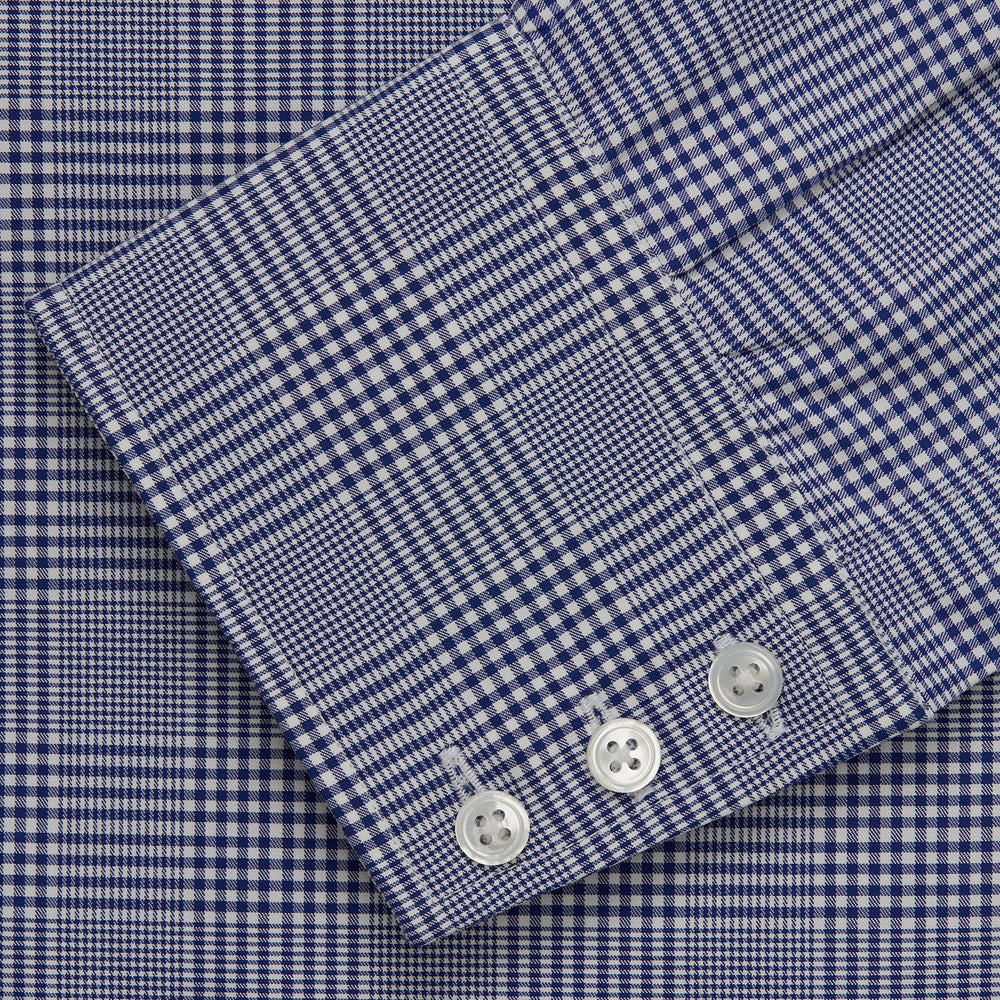 The Turnbull & Asser Navy Check Shirt, featuring a T&A collar and 3-button cuffs, is displayed on a white background.