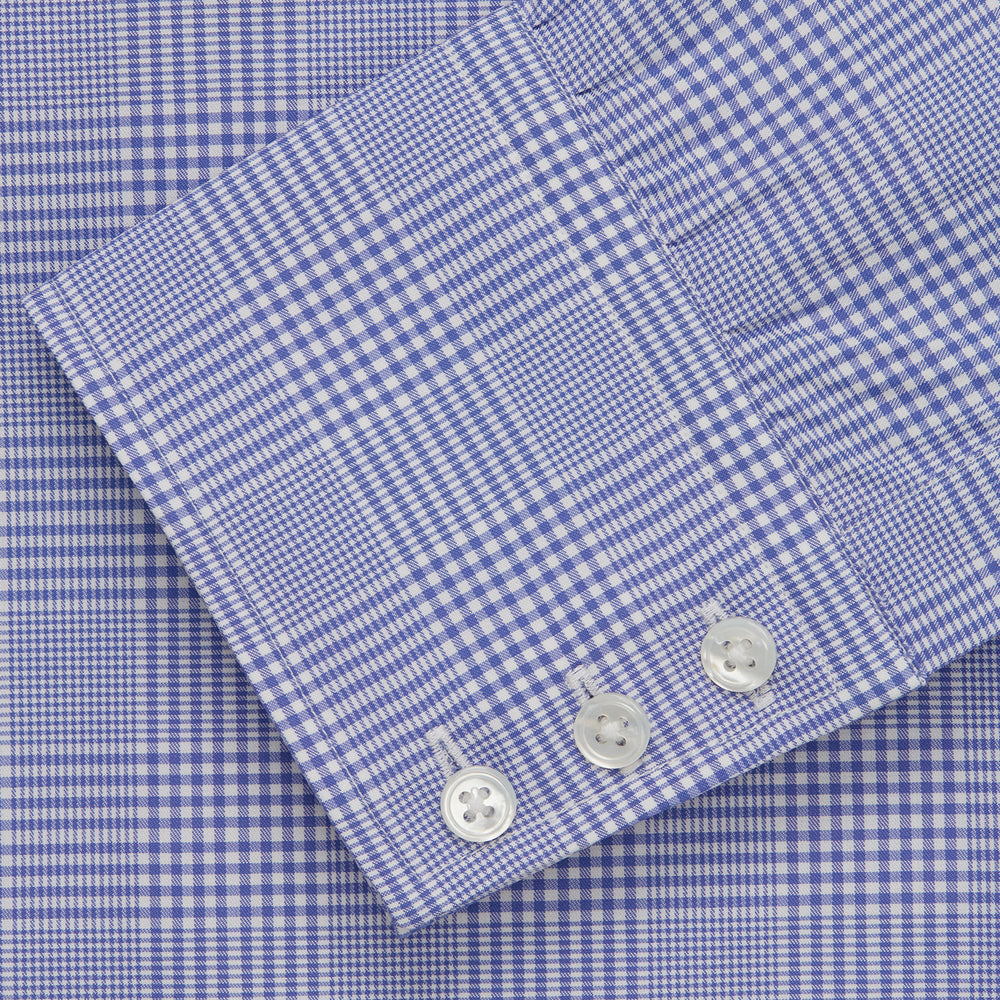 The Turnbull & Asser Blue Check Shirt features a T&A collar, 3-button cuffs, and a tonal blue check pattern in royal cotton twill. This long-sleeved, regular fit shirt is displayed on a white background.