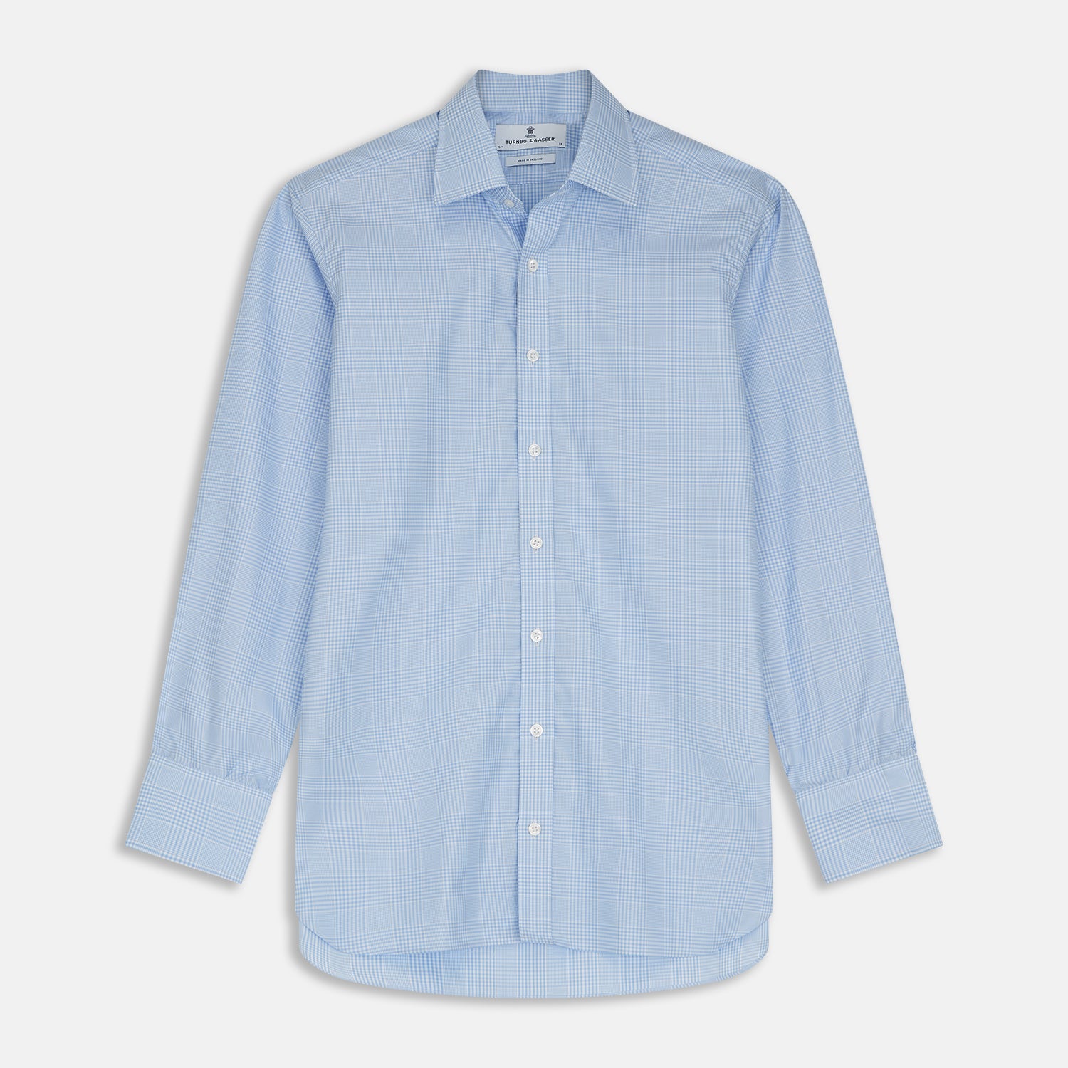 View 1 of product The Turnbull & Asser Pale Blue Check Shirt features a T&A collar, 3-button cuffs, and a subtle tonal check in royal cotton twill. It’s long-sleeved, regular fit, and shown flat on a white background.