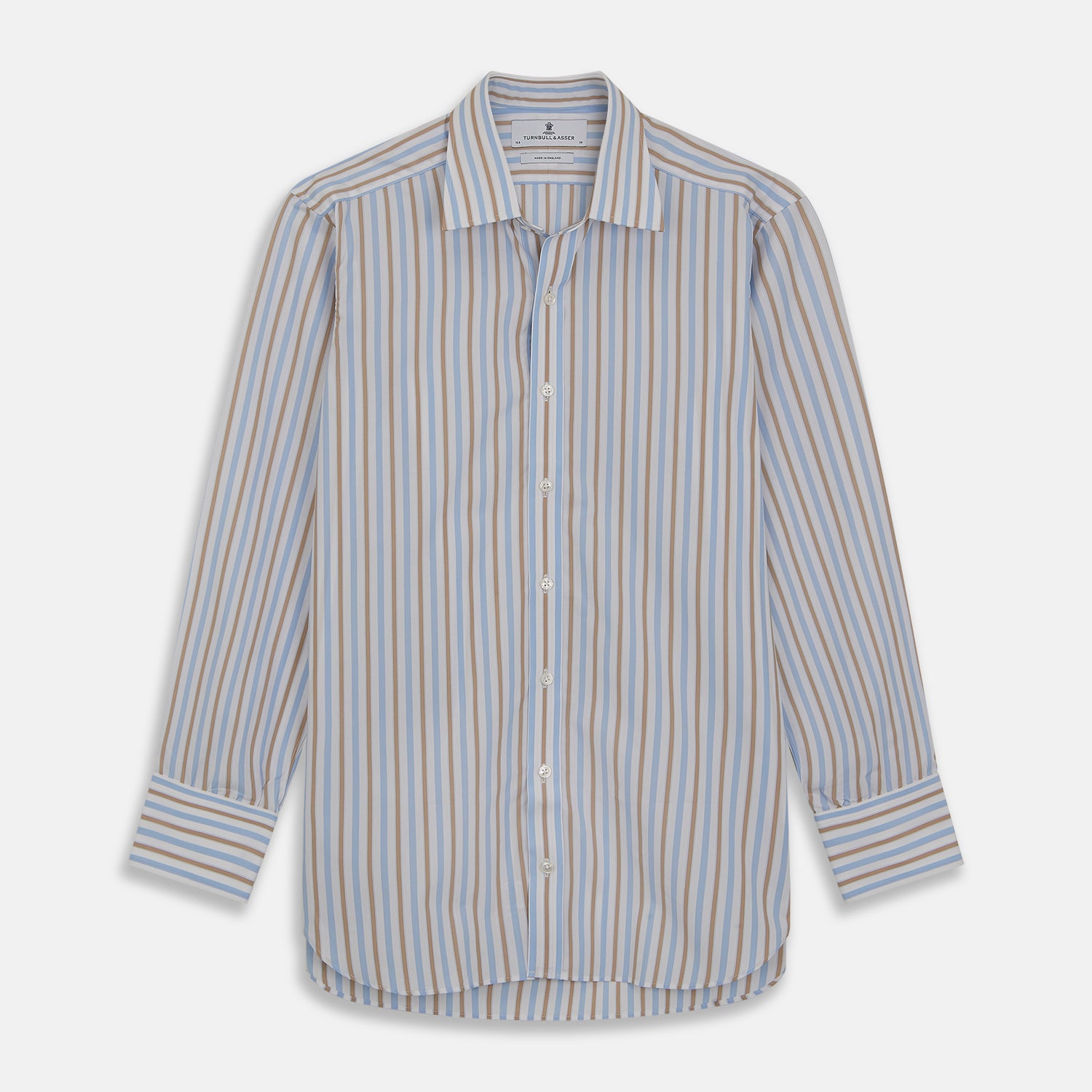 View 1 of product The Turnbull & Asser Blue and Brown Stripe Poplin Shirt features a T&A collar, three-button cuffs, and vertical blue, white, and tan stripes. This smart-casual shirt is displayed on a plain light background.