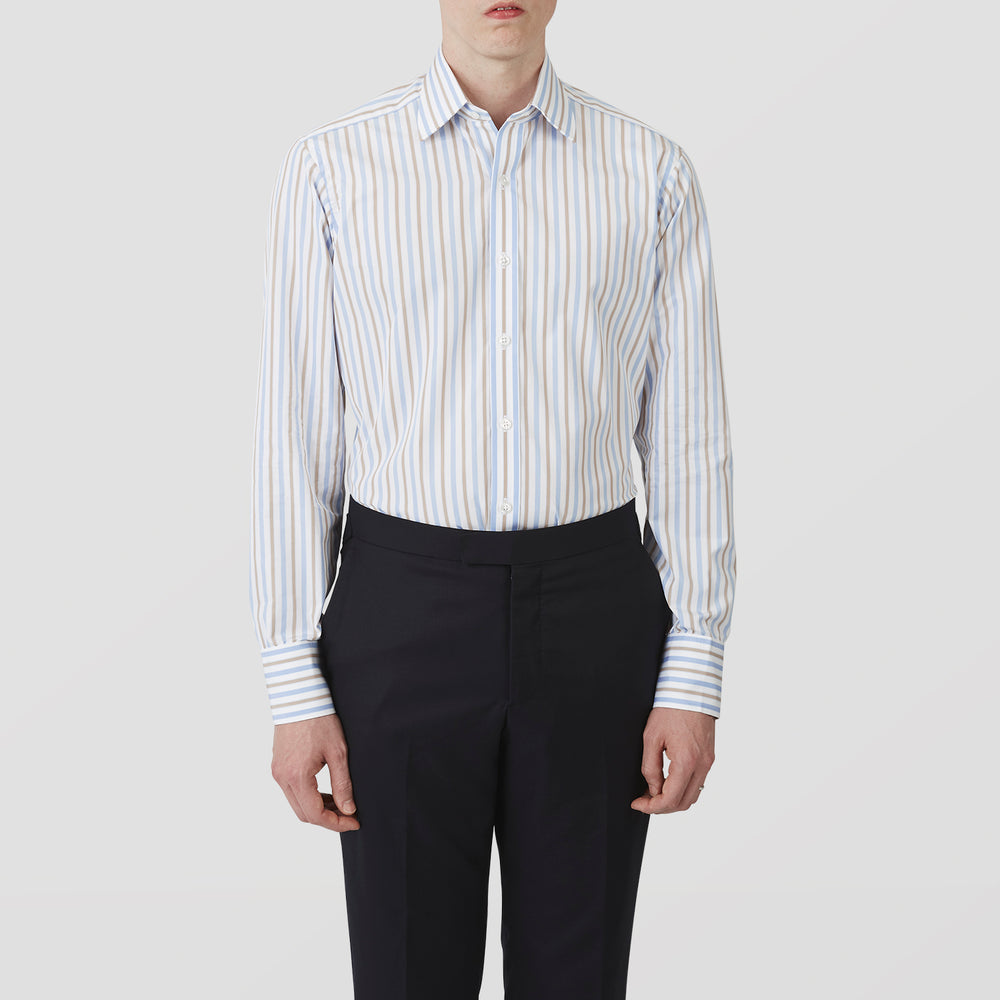 The Turnbull & Asser Blue and Brown Stripe Poplin Shirt features a T&A collar, three-button cuffs, and vertical blue, white, and tan stripes. This smart-casual shirt is displayed on a plain light background.
