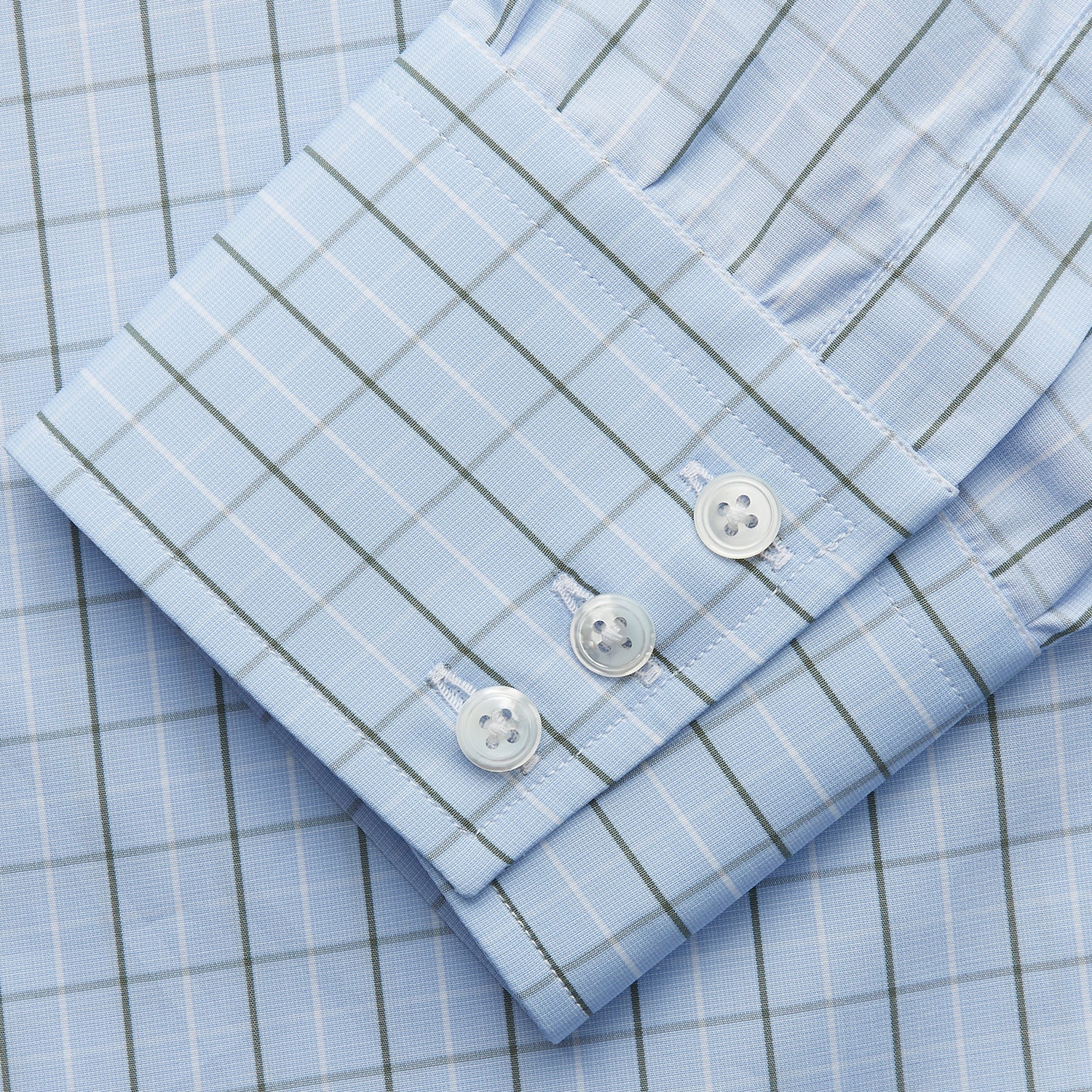 View 3 of product The Turnbull & Asser Green Graph Check Regular Fit Shirt features a T&A collar, 3-button cuffs, and a timeless grid check pattern for a classic look.