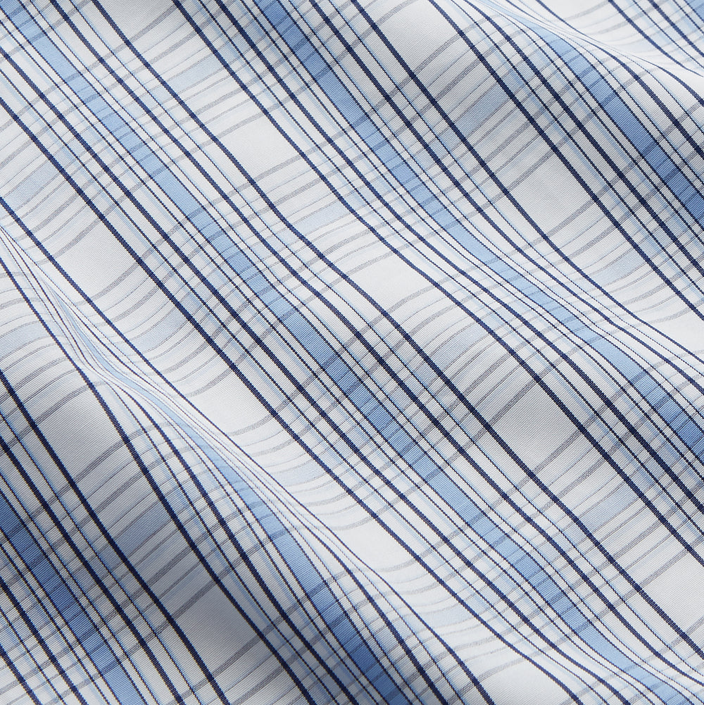The Turnbull & Asser Tonal Blue Check Regular Fit Shirt with T&A collar and 3-button cuffs is displayed flat on a white background, highlighting its blue and white plaid pattern and long sleeves.