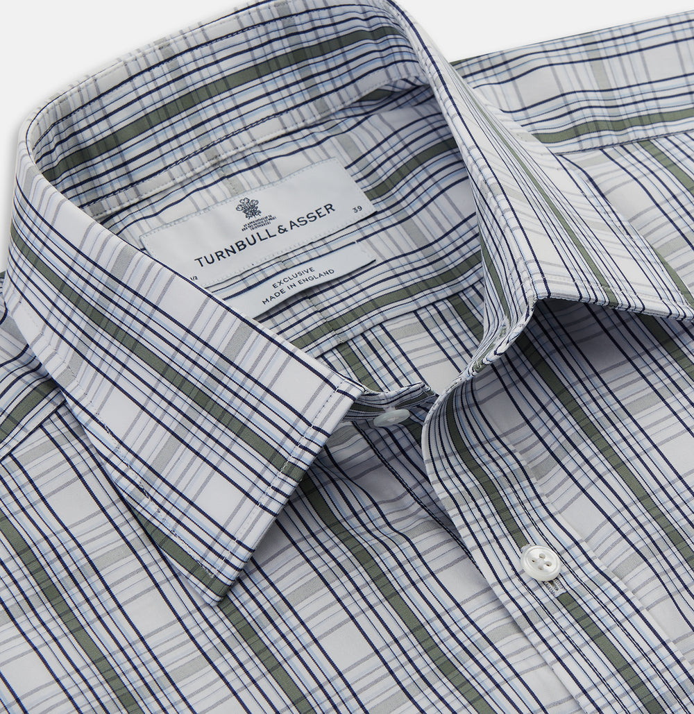 The Tonal Green Check Regular Fit Shirt by Turnbull & Asser features a T&A collar, 3-button cuffs, and a blue and white plaid pattern, crafted from Italian cotton poplin. Displayed on a white background.