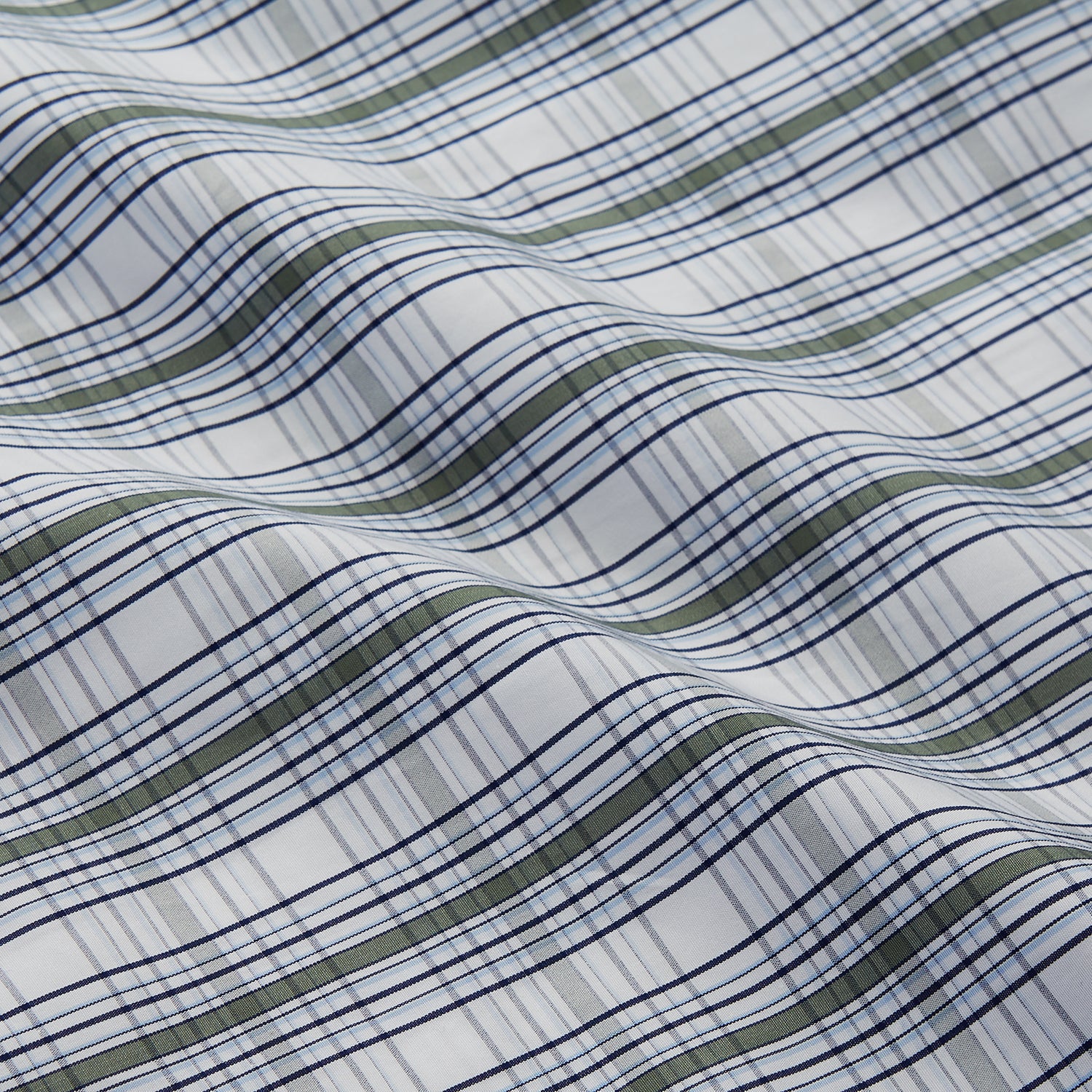 View 4 of product The Tonal Green Check Regular Fit Shirt by Turnbull & Asser features a T&A collar, 3-button cuffs, and a blue and white plaid pattern, crafted from Italian cotton poplin. Displayed on a white background.