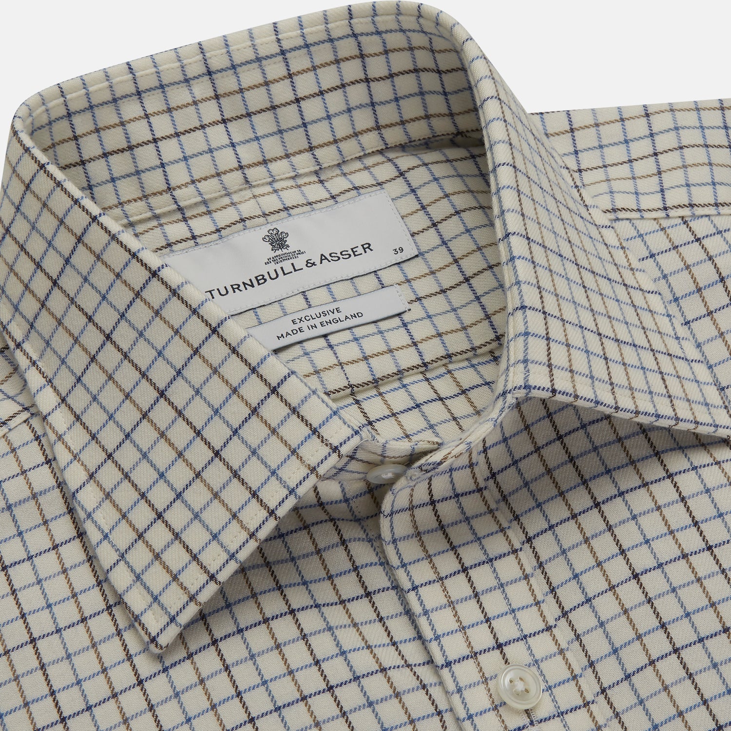 View 2 of product The Turnbull & Asser Blue Multi Check Cotton-Cashmere Shirt features a T&A collar, 3-button cuffs, and white buttons. Its smart-casual design showcases light blue, green, and beige checks on a white background.