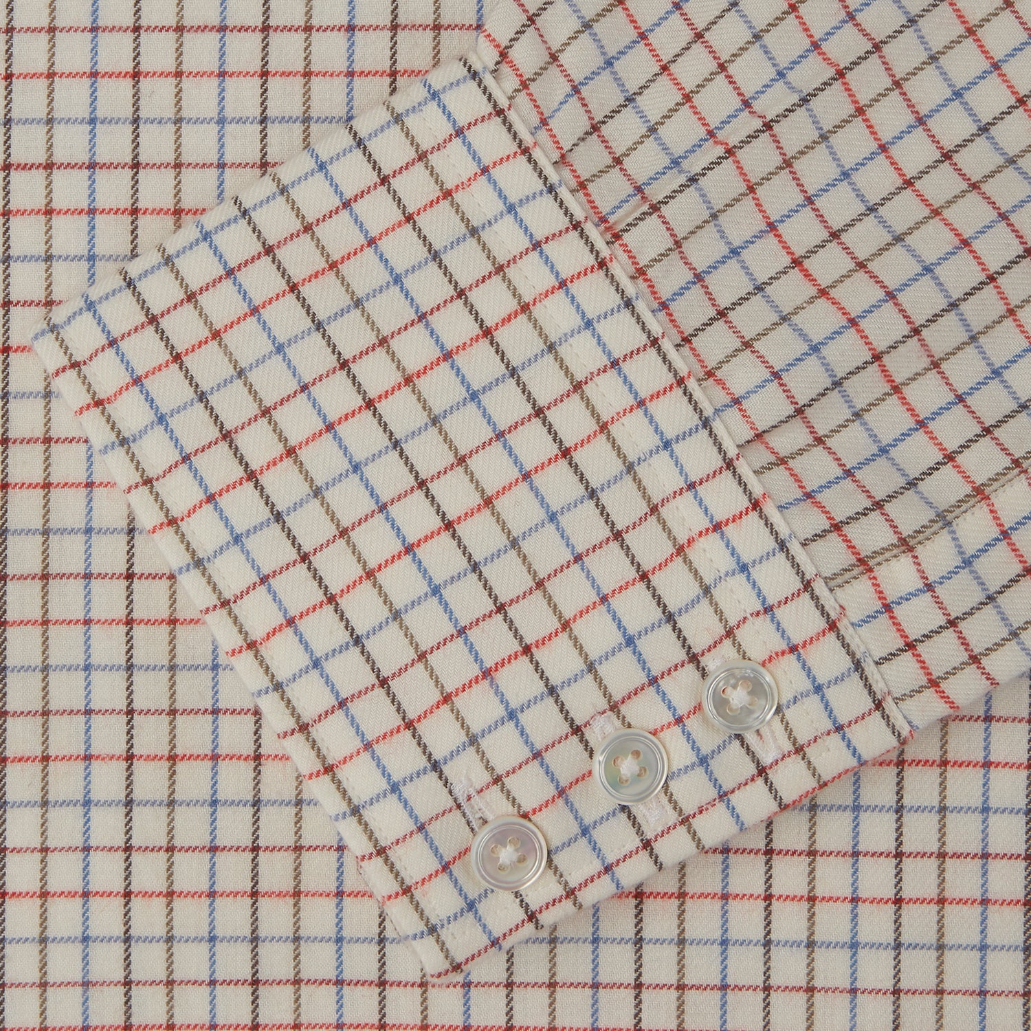 View 3 of product The Pink Multi Check Cotton-Cashmere Shirt by Turnbull & Asser features a T&A collar, 3-button cuffs, and a soft blend fabric in brown, beige, blue, and subtle pink checks—ideal for smart-casual style.