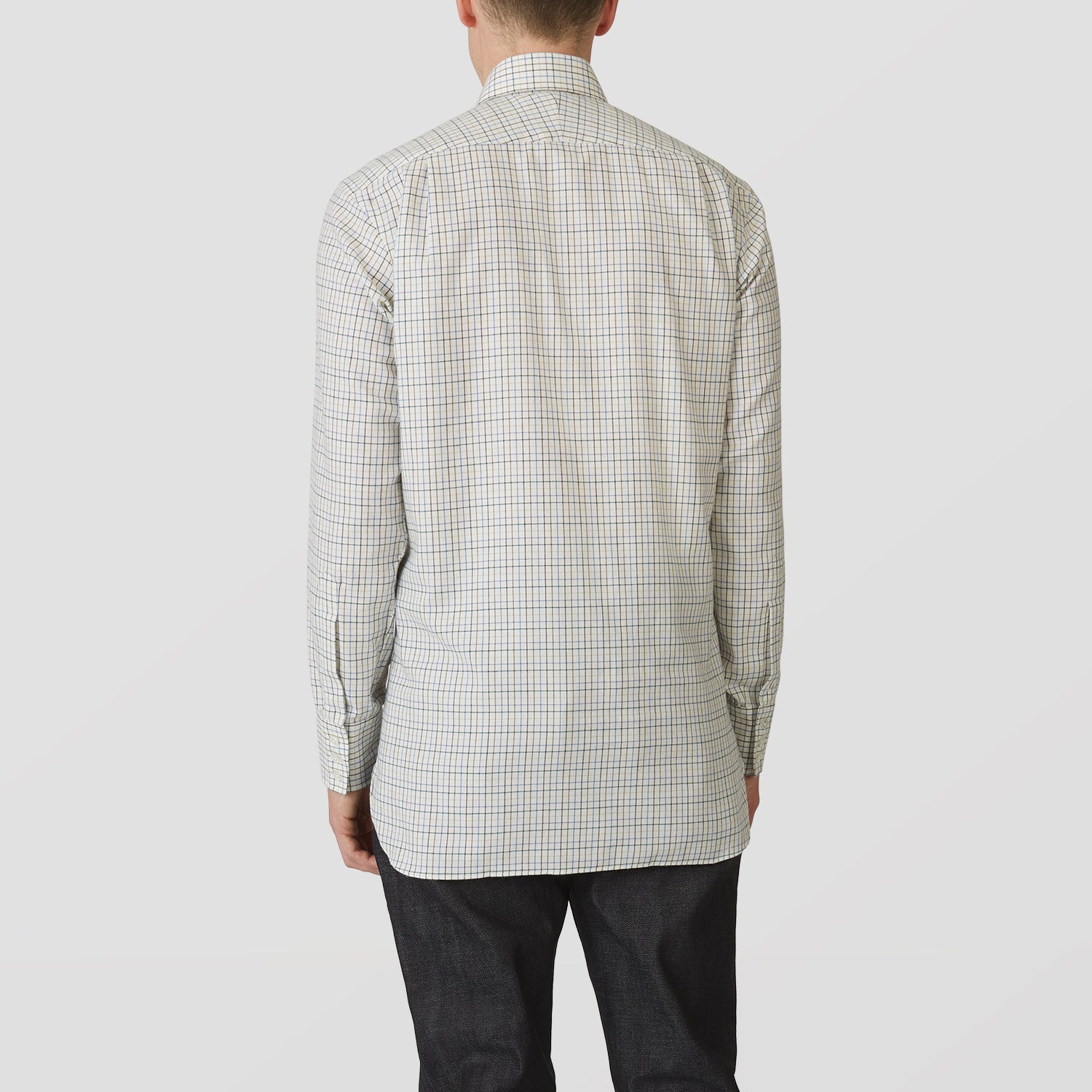 View 3 of product The Turnbull & Asser Green Multi Check Cotton-Cashmere Shirt features a T&A collar, 3-button cuffs, and a tonal green, beige, and blue check pattern. Shown flat against a white background.