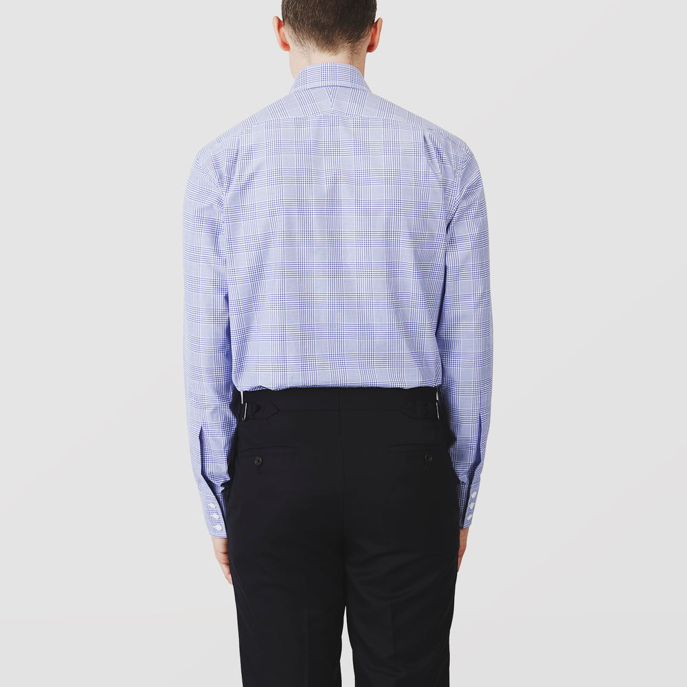The Turnbull & Asser Blue Check Shirt features a T&A collar, 3-button cuffs, and a tonal blue check pattern in royal cotton twill. This long-sleeved, regular fit shirt is displayed on a white background.