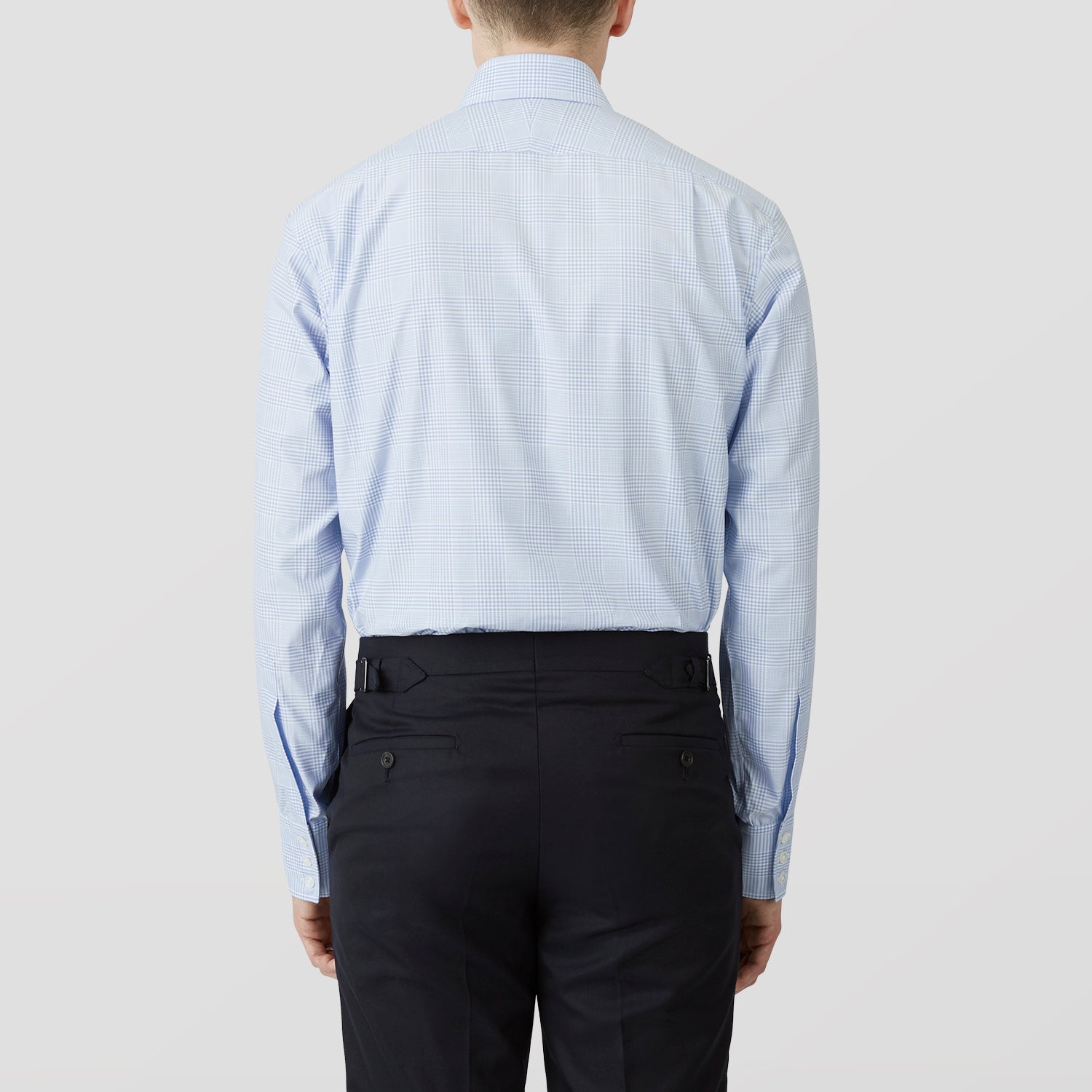 View 3 of product The Turnbull & Asser Pale Blue Check Shirt features a T&A collar, 3-button cuffs, and a subtle tonal check in royal cotton twill. It’s long-sleeved, regular fit, and shown flat on a white background.