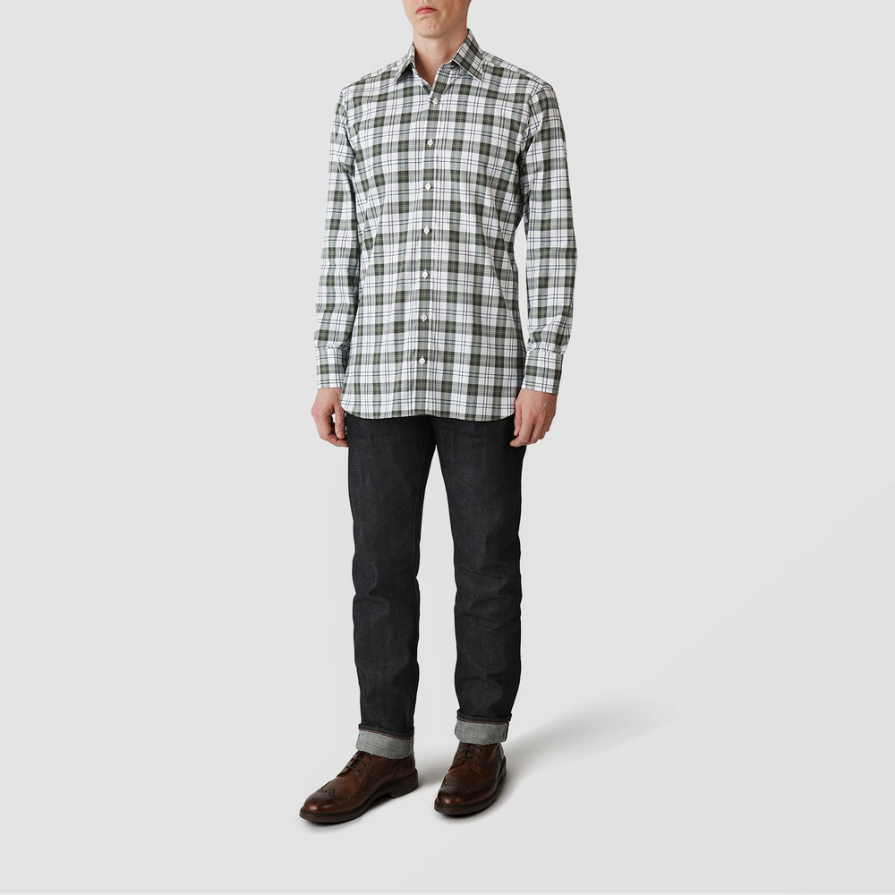 The Turnbull & Asser Green Check Shirt features a classic T&A collar, white buttons down the front and on 3-button cuffs, and a bold green, white, and black plaid pattern.