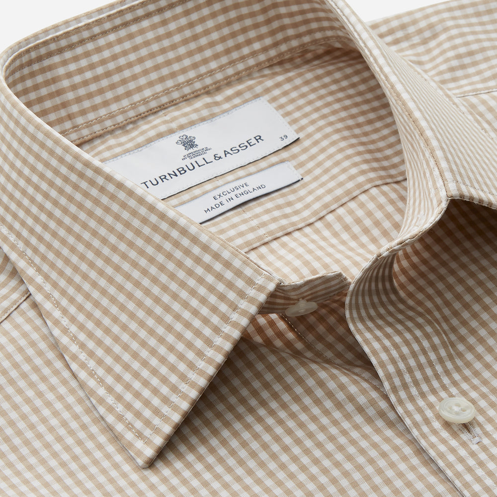 The Sand Gingham Check Regular Fit Shirt by Turnbull & Asser features a T&A collar, 3-button cuffs, and a sand gingham check pattern on white.