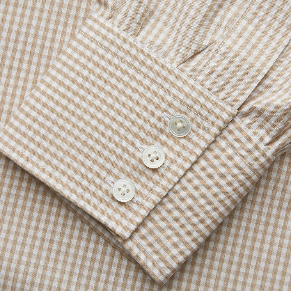 The Sand Gingham Check Regular Fit Shirt by Turnbull & Asser features a T&A collar, 3-button cuffs, and a sand gingham check pattern on white.