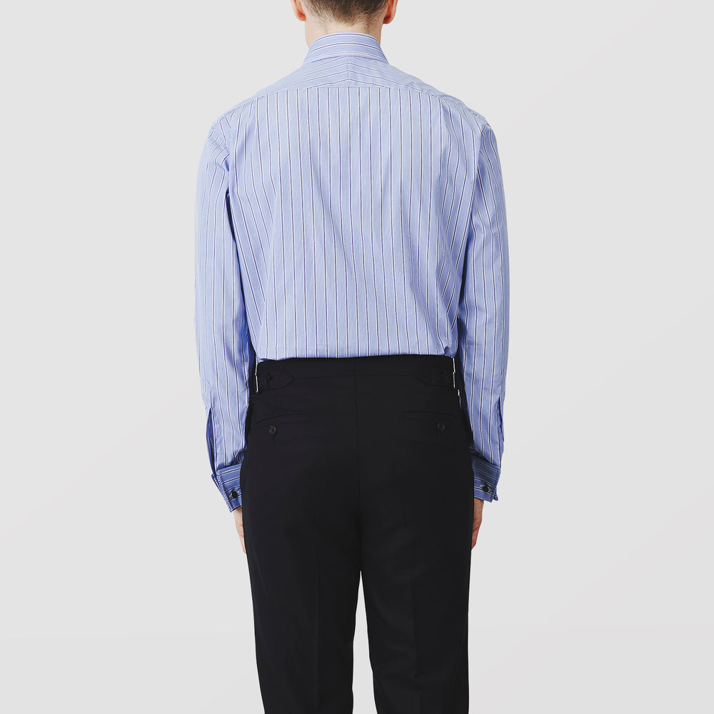 A neatly folded Turnbull & Asser Blue Stripe Regular Fit Shirt with T&A collar and square double cuffs, featuring long sleeves and thin white stripes on a light blue base, displayed on a plain white background.