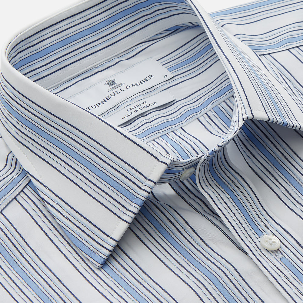 The Turnbull & Asser Blue Multi Stripe Regular Fit Shirt features a classic T&A collar, long sleeves, button-down front, and 3 button cuffs. Shown laid flat against a white background.