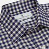 View 4 of product The Turnbull & Asser Blue Check Weekend Fit Shirt features a Derby collar and 1-button cuffs—ideal for winter layering. Shirt is laid flat on a white background.