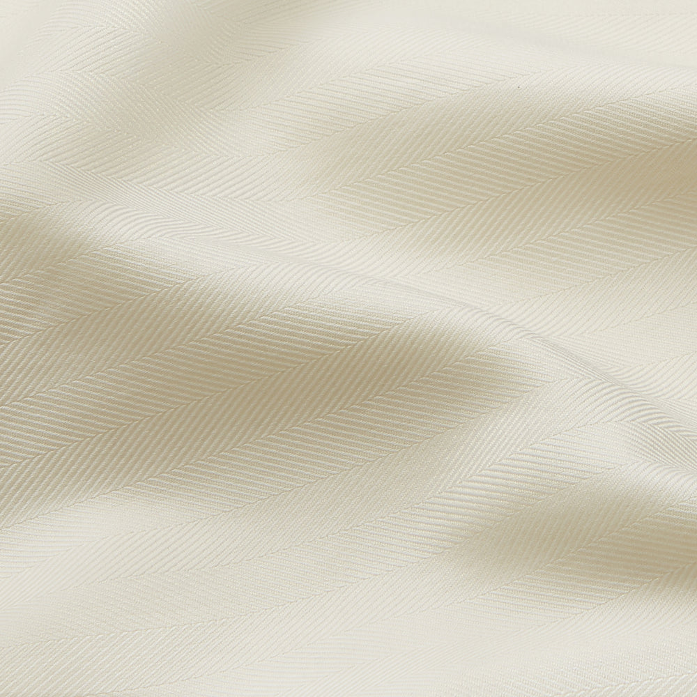 The Cream Herringbone Fine Cotton Weekend Officer Fit Shirt by Turnbull & Asser features a Dorset collar, long sleeves, two button-flap chest pockets, and buttoned cuffs—perfect for smart-casual style.