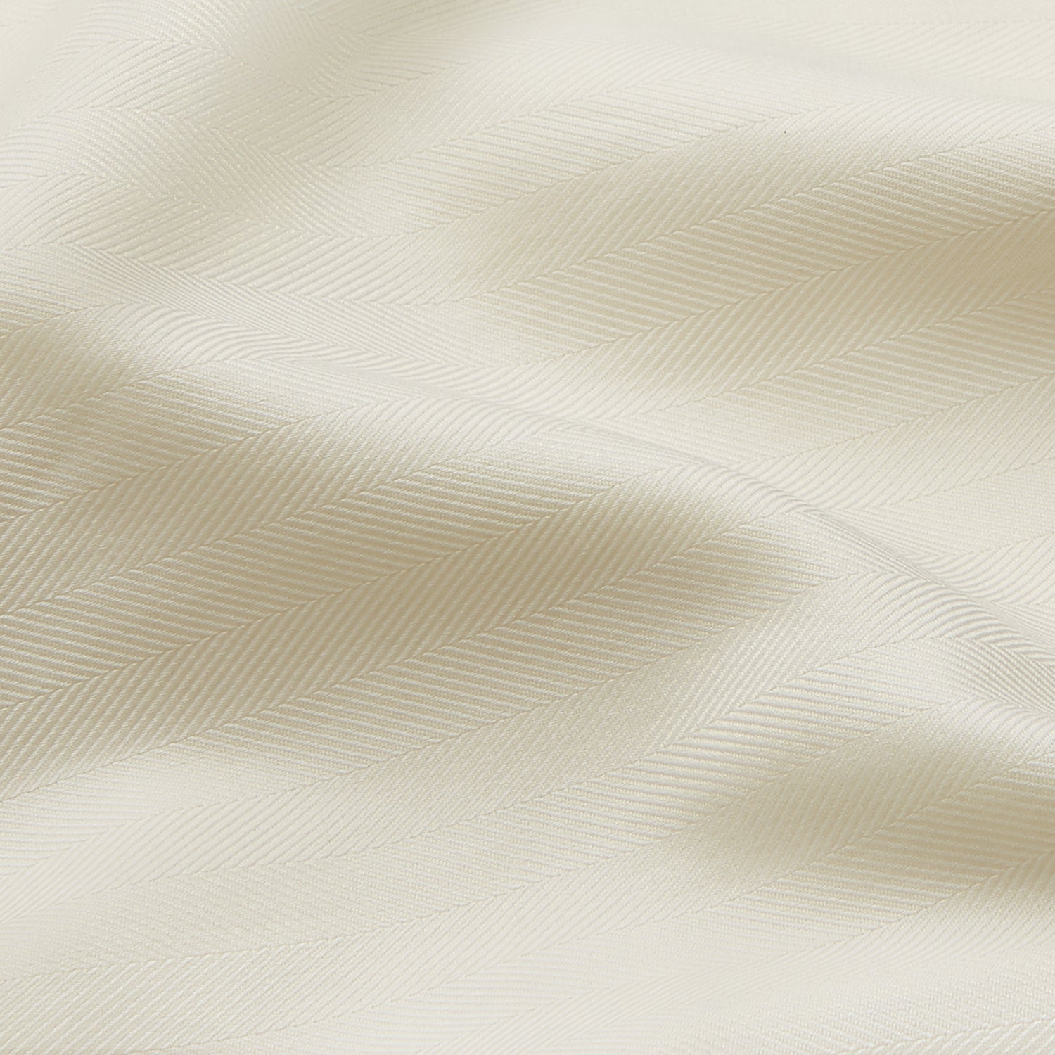 View 4 of product The Cream Herringbone Fine Cotton Weekend Officer Fit Shirt by Turnbull & Asser features a Dorset collar, long sleeves, two button-flap chest pockets, and buttoned cuffs—perfect for smart-casual style.