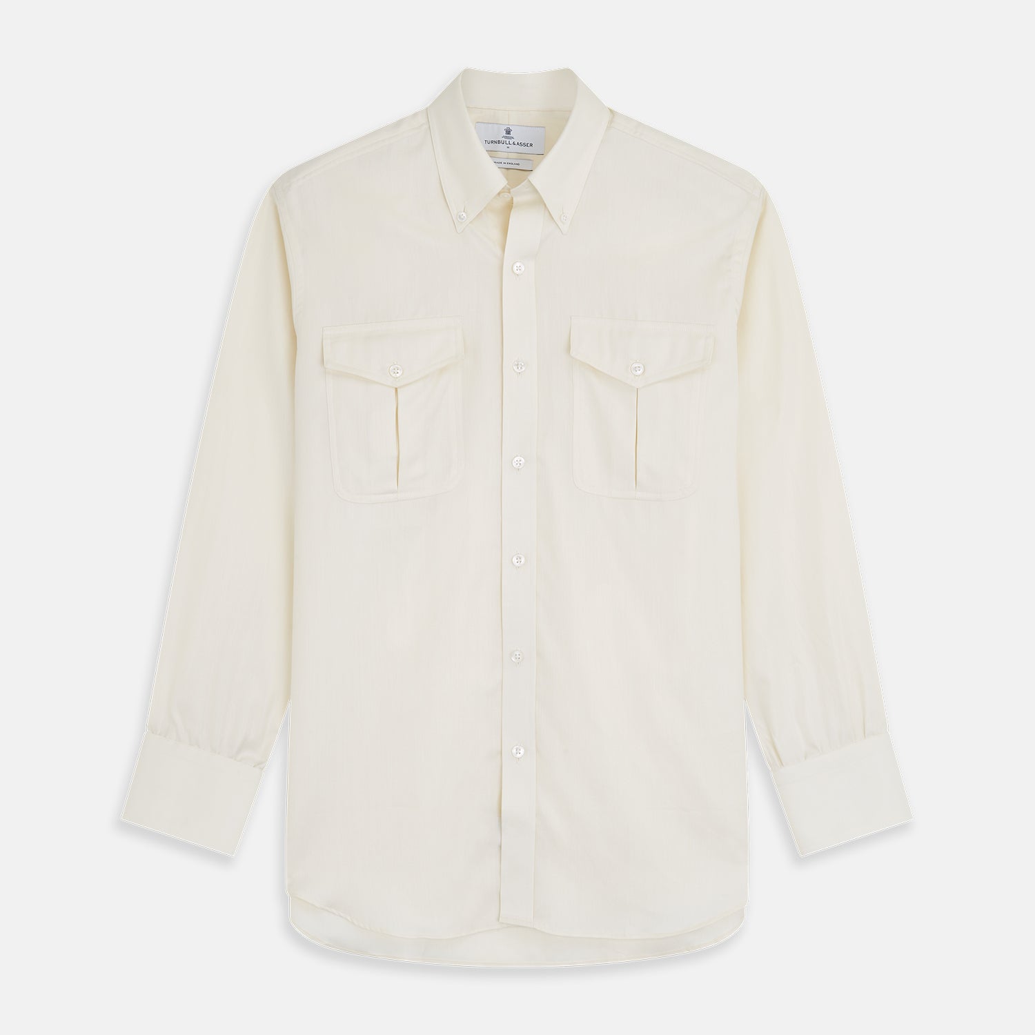View 1 of product The Cream Herringbone Fine Cotton Weekend Officer Fit Shirt by Turnbull & Asser features a Dorset collar, long sleeves, two button-flap chest pockets, and buttoned cuffs—perfect for smart-casual style.
