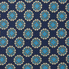 View 3 of product A rolled Navy Floral Geometric Tie by Turnbull & Asser, shown on a light background with light blue and white geometric floral motifs—a refined, stylish accessory.