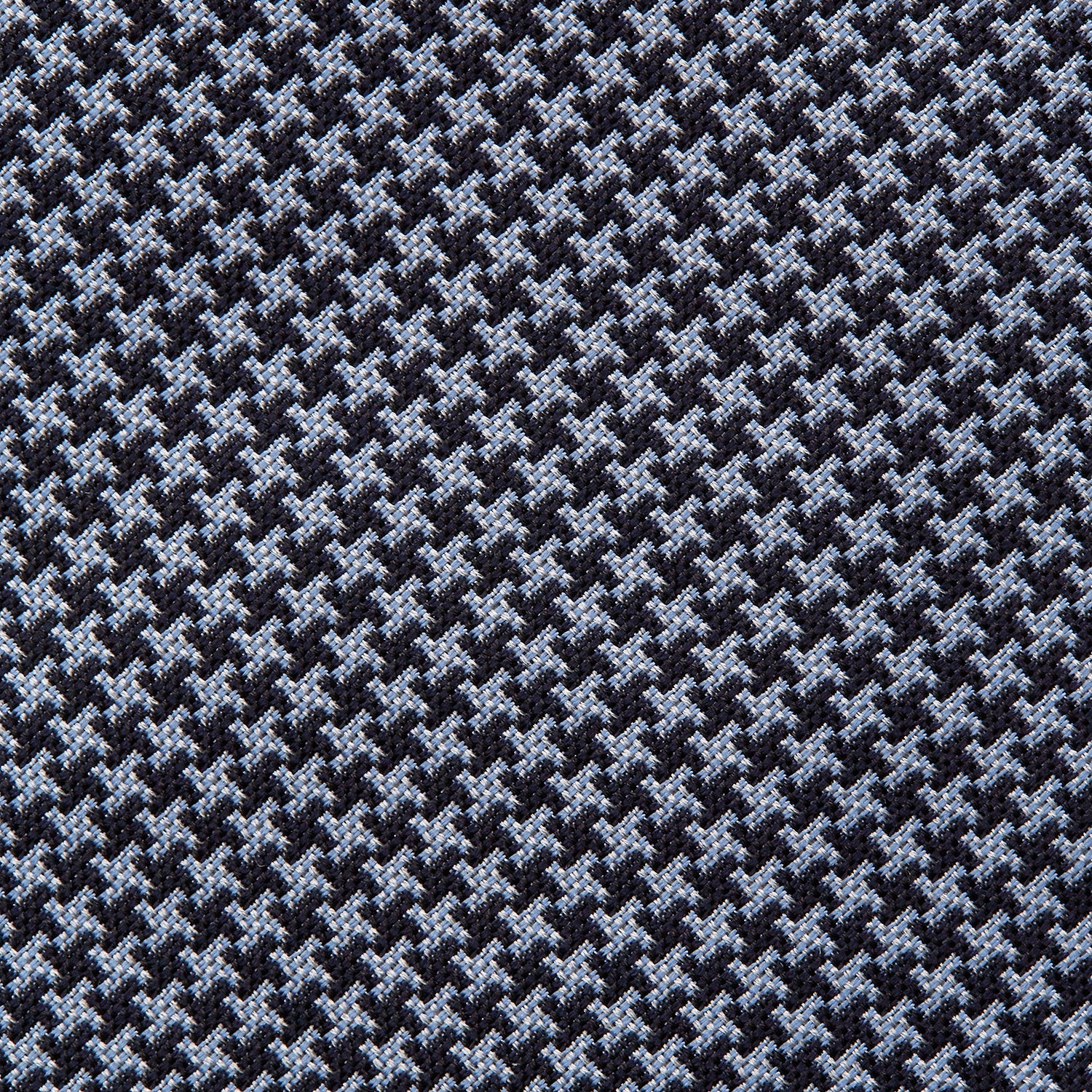 View 3 of product The Turnbull & Asser Blue Houndstooth Silk Tie, shown rolled on a plain white background, adds a refined touch to any sophisticated wardrobe.