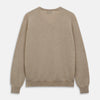 View 3 of product The Beige Paden V-Neck Jumper by Turnbull & Asser, made of pure cashmere, features long sleeves and ribbed cuffs and hem. It is shown flat on a white background with the label visible at the neckline.