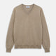 The Beige Paden V-Neck Jumper by Turnbull & Asser, made of pure cashmere, features long sleeves and ribbed cuffs and hem. It is shown flat on a white background with the label visible at the neckline.