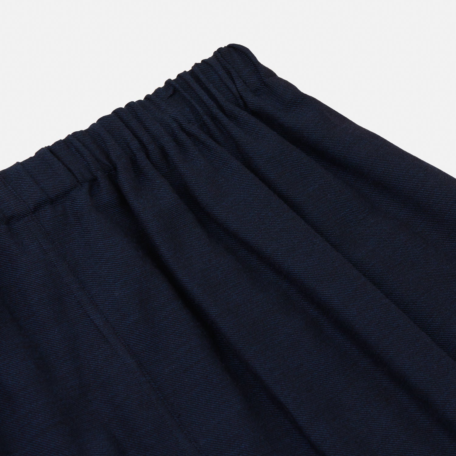 View 2 of product Turnbull & Asser Navy Cotton-Cashmere Pyjama Trousers feature a straight-leg cut and elastic waistband for a contemporary fit, shown laid flat on a white background.