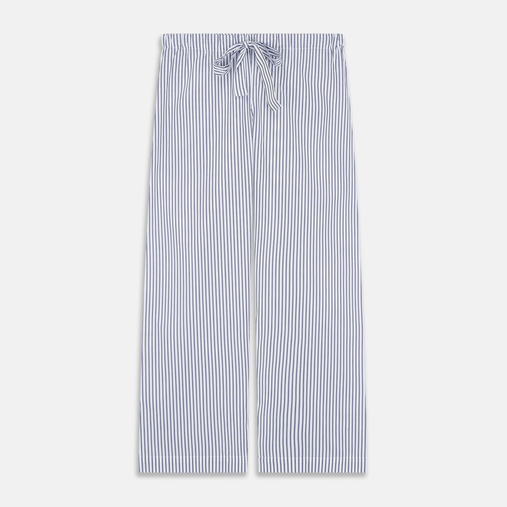 The Women's Dara Navy Stripe Pyjama Set by Turnbull & Asser features a long-sleeve button-up shirt with chest pocket and drawstring pants in premium cotton, shown neatly on a white background.