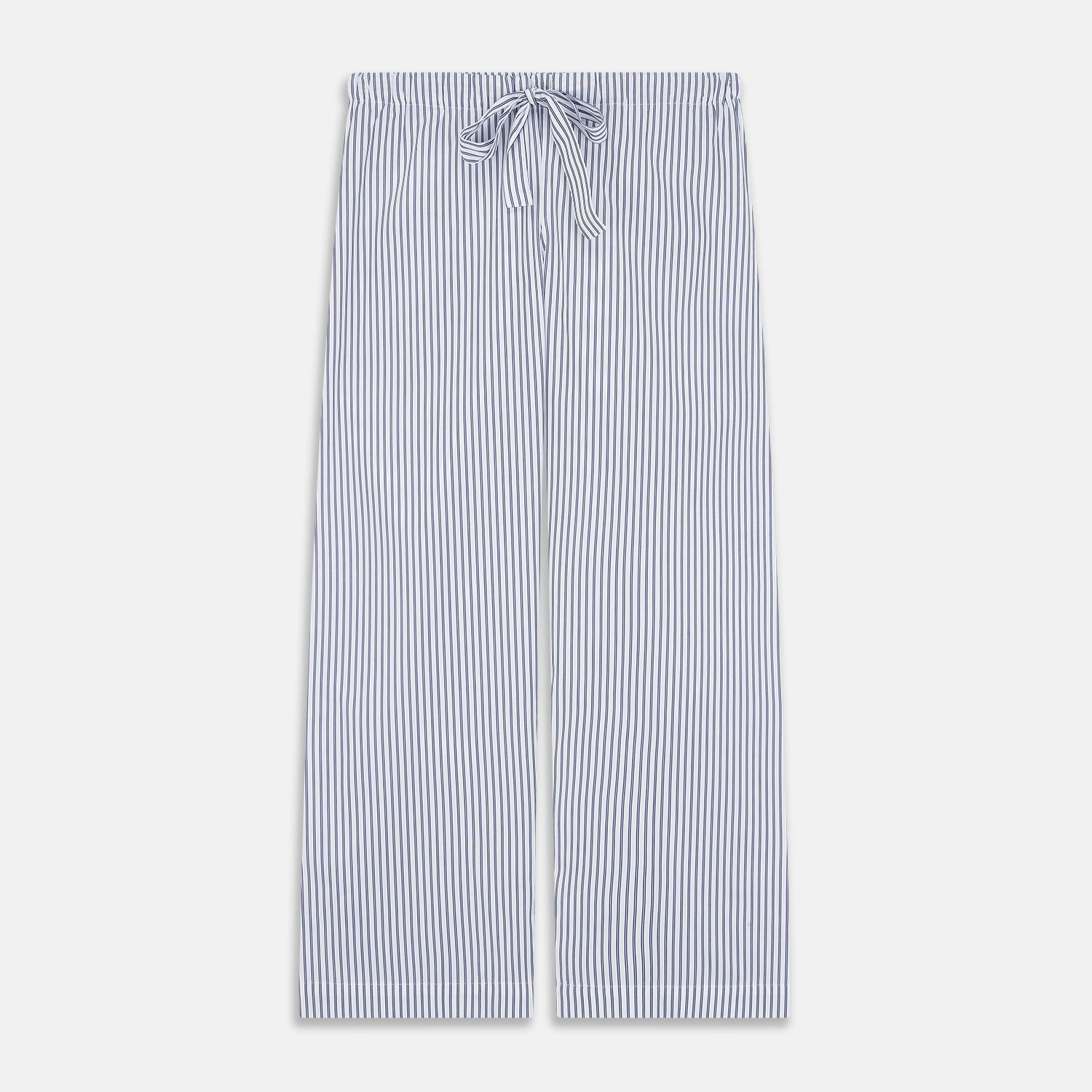 View 4 of product The Women's Dara Navy Stripe Pyjama Set by Turnbull & Asser features a long-sleeve button-up shirt with chest pocket and drawstring pants in premium cotton, shown neatly on a white background.