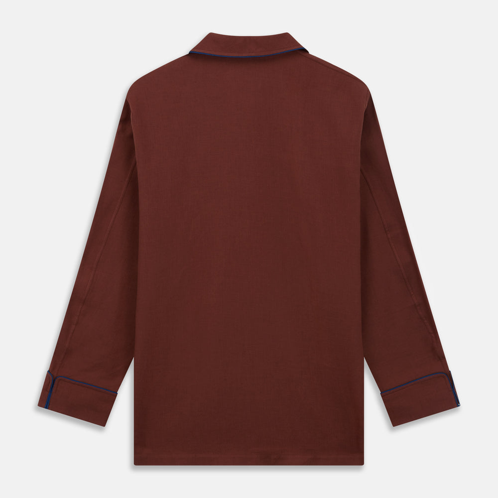 The Turnbull & Asser Red Cotton-Cashmere Pyjama Set features a rust-red long-sleeve button-up top with chest pocket and matching waist-tied pants, shown on a plain white background.
