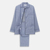 View 1 of product The Turnbull & Asser Blue Check Modern Cotton Pyjama Set features a long-sleeve button-up top and matching pants, crafted from thicker cotton for added comfort, shown against a white background.