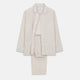 The Turnbull & Asser Sand Bengal Stripe Modern Fit Cotton Pyjama Set features cream-colored striped Italian cotton, with a long-sleeved button-up top and matching drawstring pants, neatly displayed against a white background.