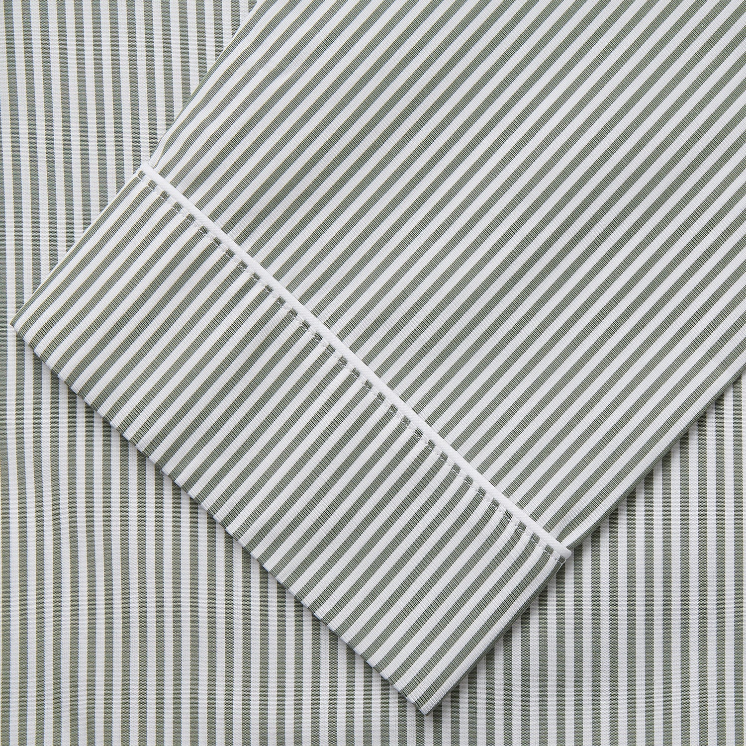 View 3 of product The Turnbull & Asser Green Bengal Stripe Modern Fit Cotton Pyjama Set features a long-sleeve button-up shirt with chest pocket and elastic waistband pants, crafted from soft Italian cotton and displayed on a white background.