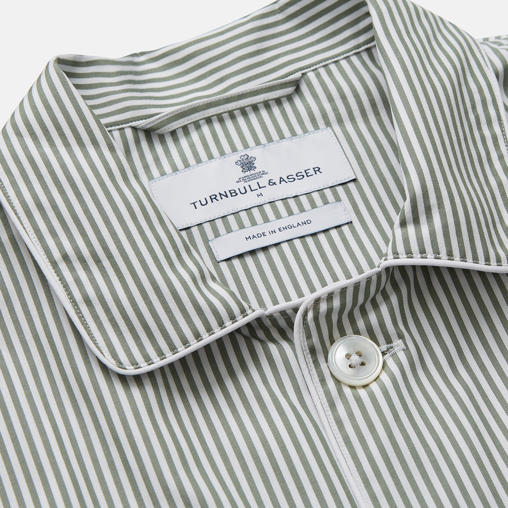 The Turnbull & Asser Green Bengal Stripe Modern Fit Cotton Pyjama Set features a long-sleeve button-up shirt with chest pocket and elastic waistband pants, crafted from soft Italian cotton and displayed on a white background.