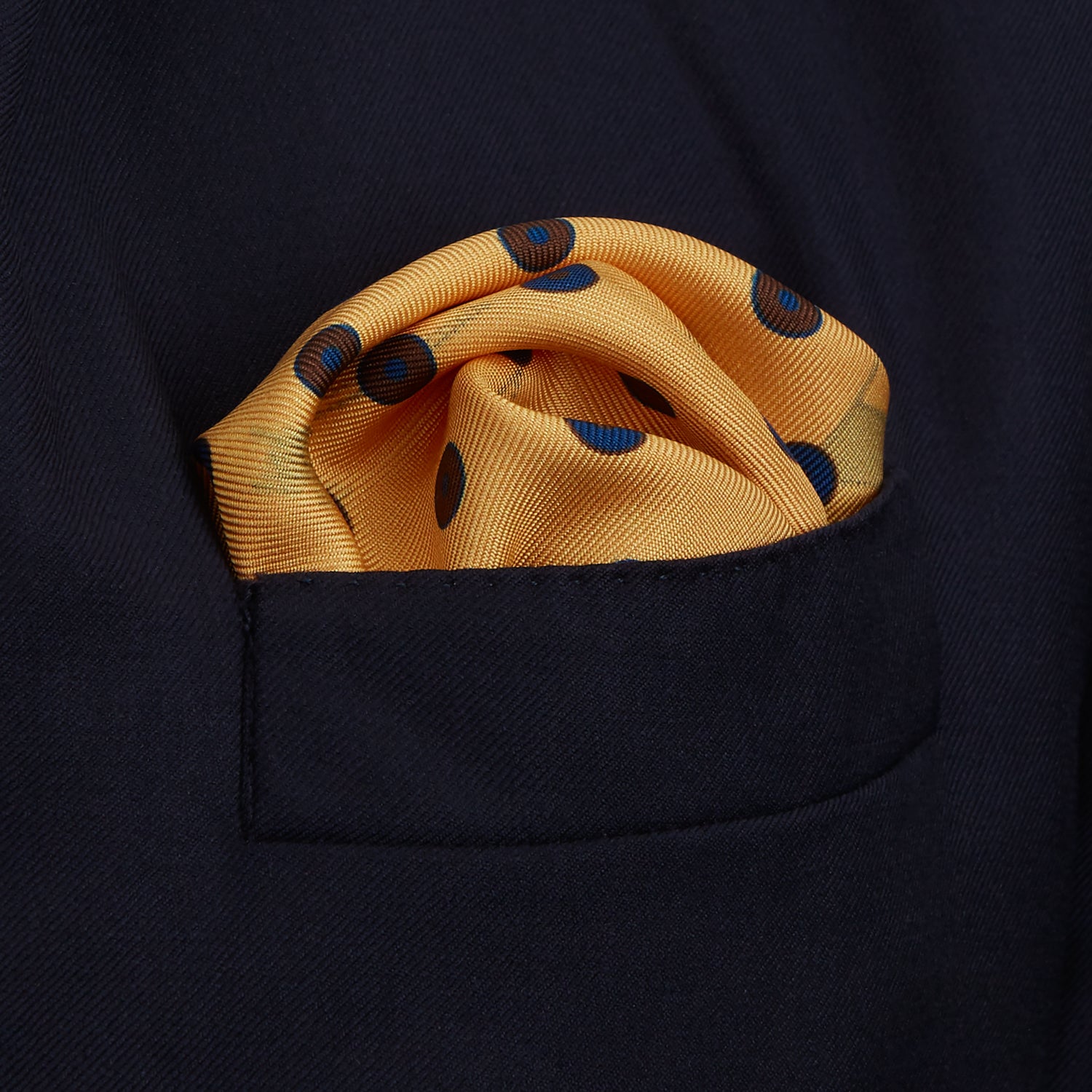 View 5 of product The Turnbull & Asser Yellow Windsurfer Double-Faced Silk Print Pocket Square features playful windsurfers on yellow silk, with a contrasting edge for a refined touch.