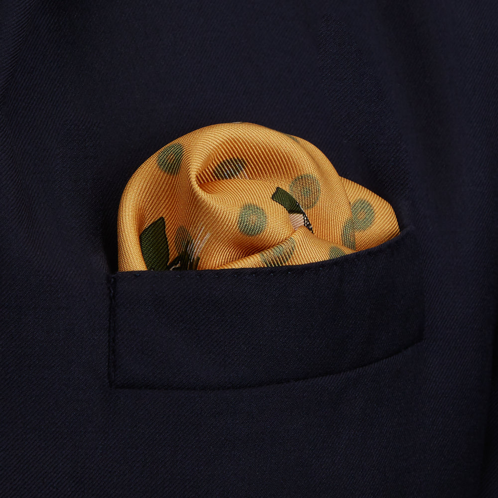 The Turnbull & Asser Yellow Windsurfer Double-Faced Silk Print Pocket Square features playful windsurfers on yellow silk, with a contrasting edge for a refined touch.