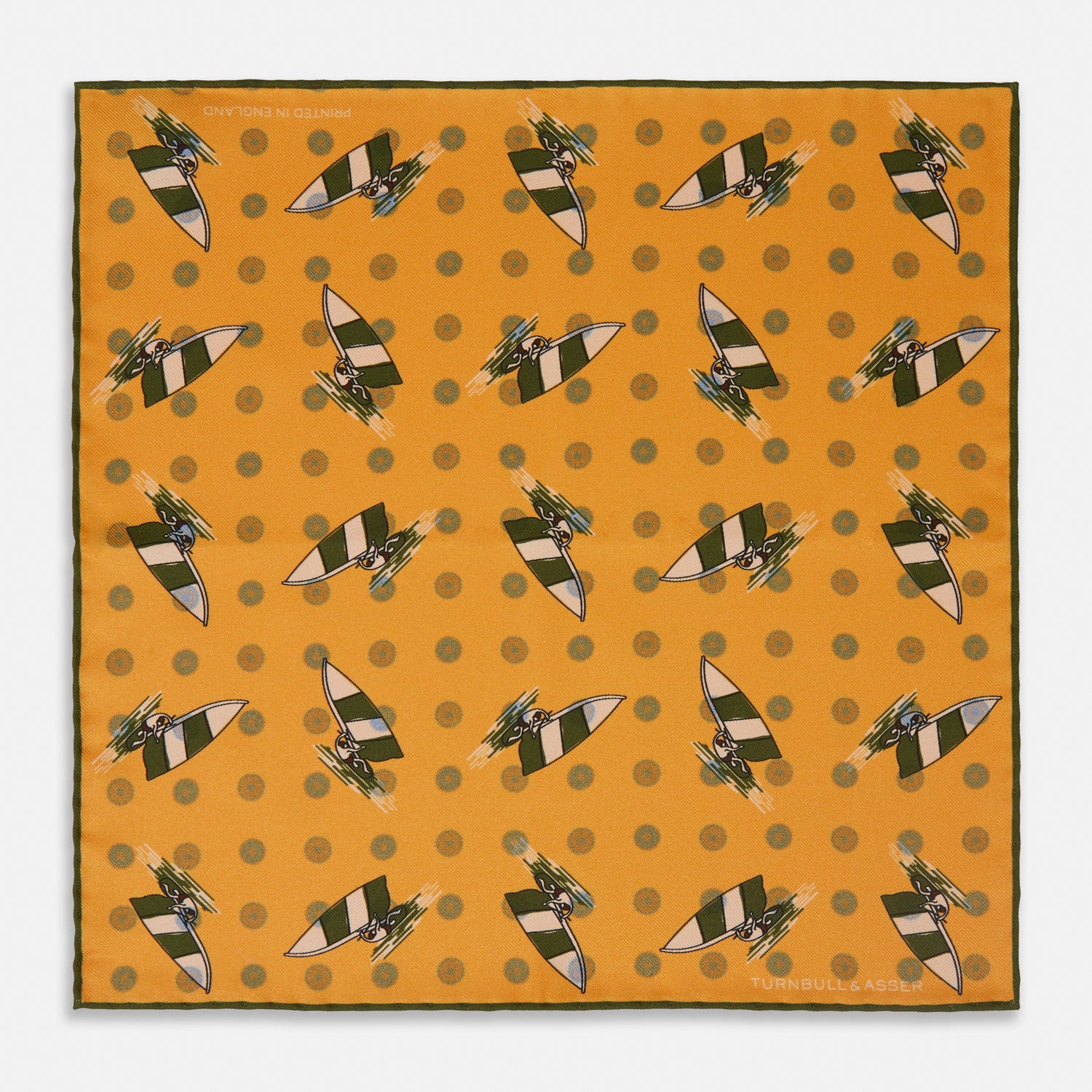 View 1 of product The Turnbull & Asser Yellow Windsurfer Double-Faced Silk Print Pocket Square features playful windsurfers on yellow silk, with a contrasting edge for a refined touch.