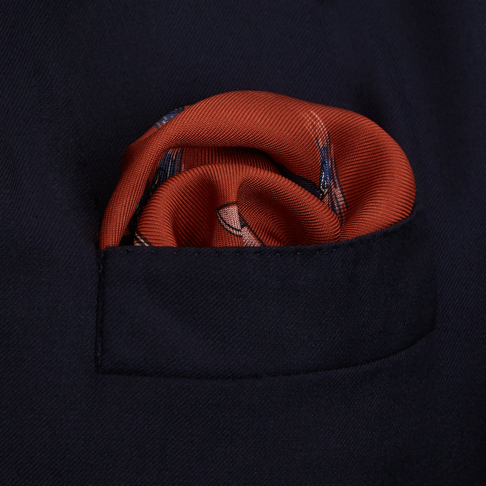 The Turnbull & Asser Red Windsurfer Double-Faced Silk Print Pocket Square features a vibrant windsurfer pattern on silk with a dark blue border and the brand subtly printed in one corner.