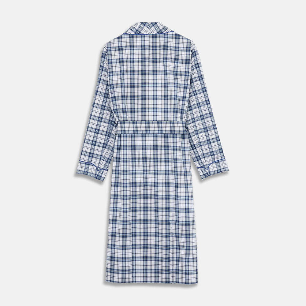 The Turnbull & Asser Blue Check Cotton Gown features long sleeves, a knee-length cut, shawl collar, and matching waist belt in a blue check pattern, shown against a plain white background.